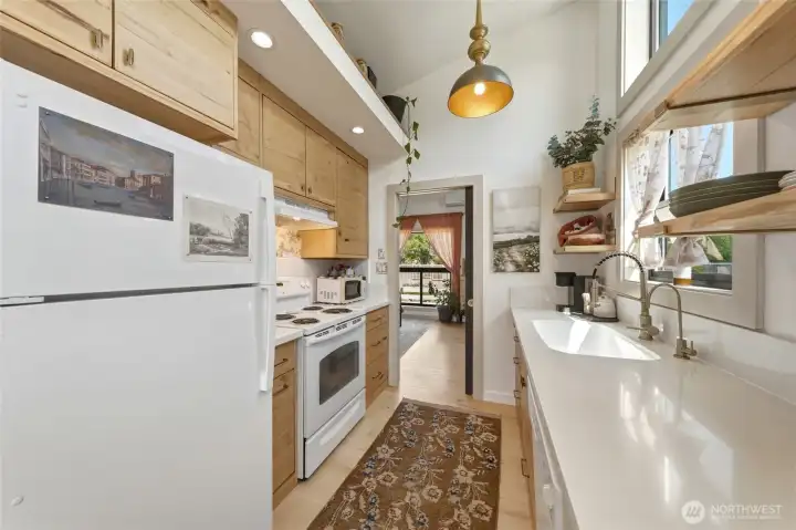 256 (ADU) Kitchen featuring custom custom cabinetry