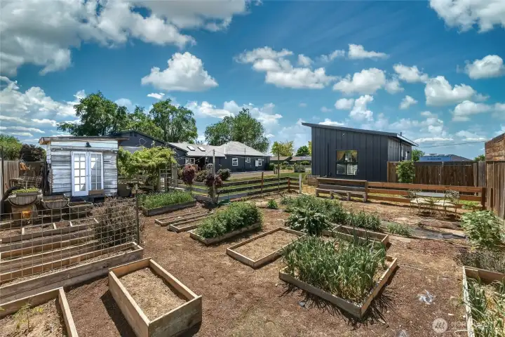 Food & cut flower garden with shed built from reclaimed materials