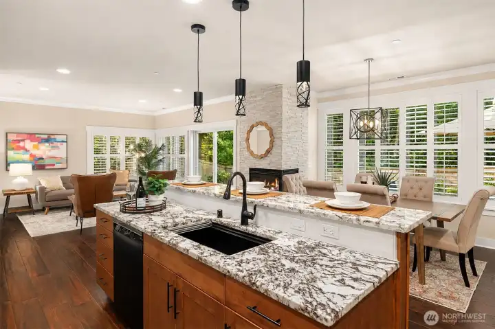 Lovely kitchen island with upgraded pendant lighting. Note: the wall colors have been virtually altered for a more neutral color palette. Sellers are open to a credit for interior painting allowance. Lovely kitchen island with upgraded pendant lighting. Note: the wall colors have been virtually altered for a more neutral color palette. Sellers are open to a credit for interior painting allowance.