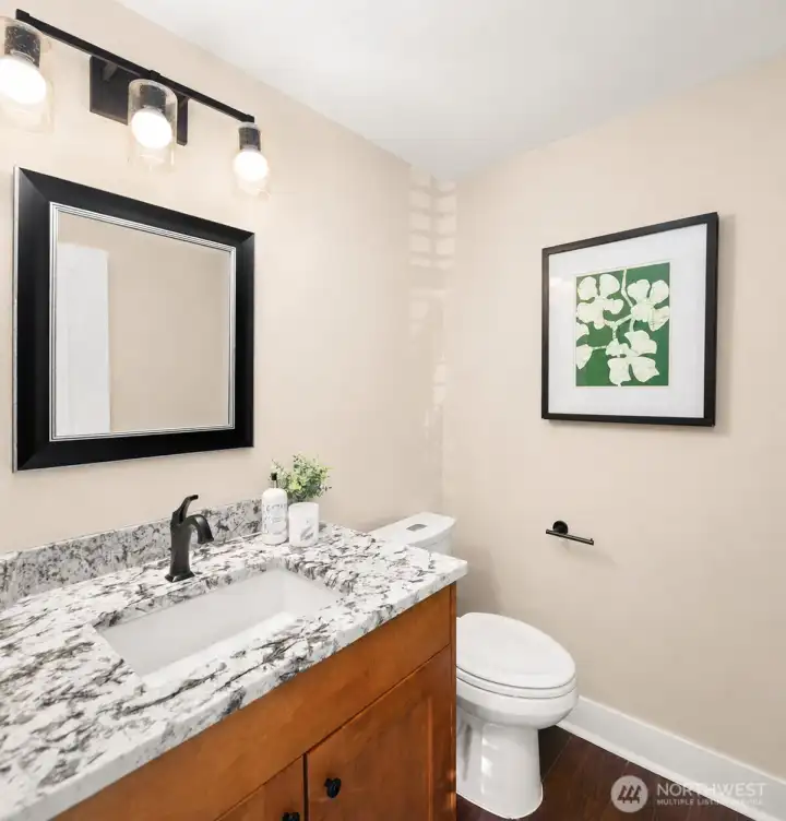 Guest bathroom on the main floor (remodeled!). The walls have been virtually altered for a more neutral color palette Guest bathroom on the main floor (remodeled!). The walls have been virtually altered for a more neutral color palette