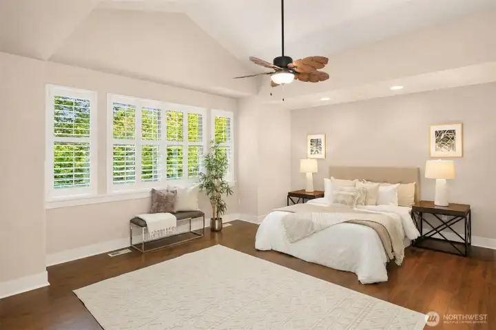 This primary bedroom has been virtually altered for a more neutral color palette. This primary bedroom has been virtually altered for a more neutral color palette.
