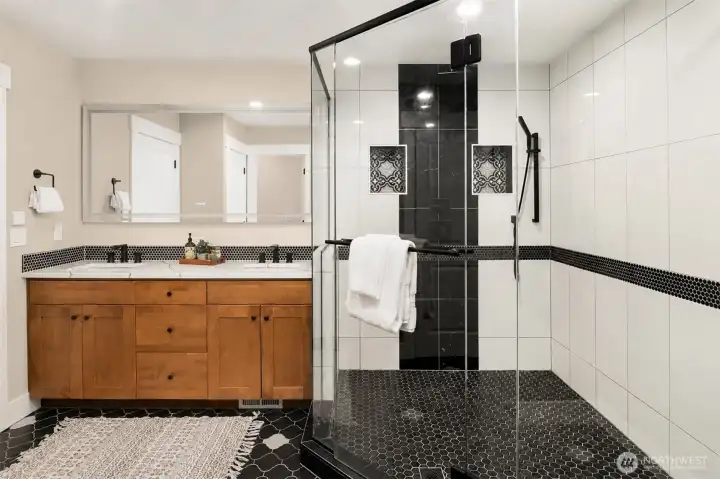 The primary bath has been virtually altered for a neutral color. The primary bath has been virtually altered for a neutral color.
