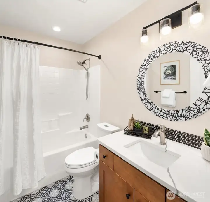 This upstair Hall Bathroom (updated and remodeled) has been virtually altered to reflect a neutral wall color. This upstair Hall Bathroom (updated and remodeled) has been virtually altered to reflect a neutral wall color.