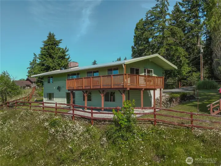 A large quarter wrap around deck where you can enjoy the views!