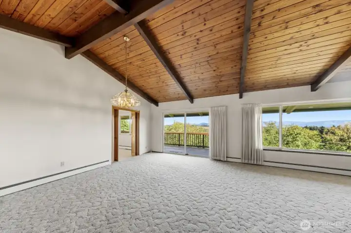 Knotty pine ceilings and windows showcasing beautiful views