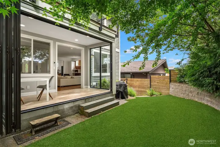 Solarium with sliding Nano doors creates an ideal setting for indoor/outdoor living, located right off the kitchen and main living space Solarium with sliding Nano doors creates an ideal setting for indoor/outdoor living, located right off the kitchen and main living space