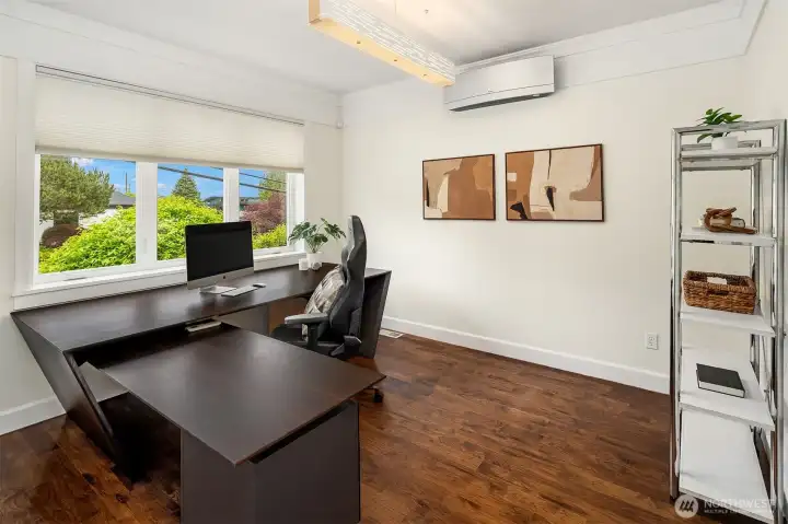 Office in front of house with large windows Office in front of house with large windows