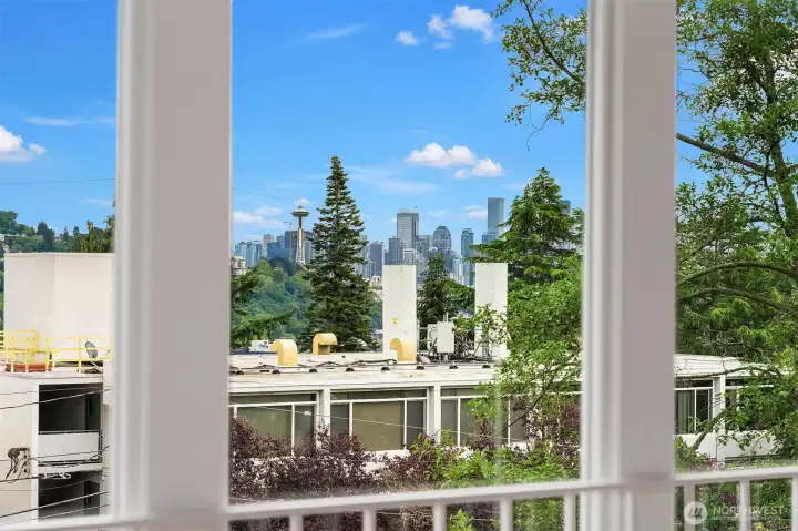 City skyline and Space Needle views from one of the upstairs bedrooms City skyline and Space Needle views from one of the upstairs bedrooms