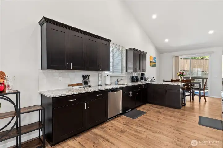Spacious kitchen featuring luxurious granite tile Spacious kitchen featuring luxurious granite tile