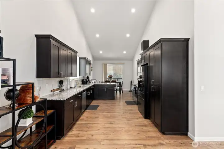 The kitchen has all the modern updates and offers ample soft closed cabinets and cooking space. The kitchen has all the modern updates and offers ample soft closed cabinets and cooking space.