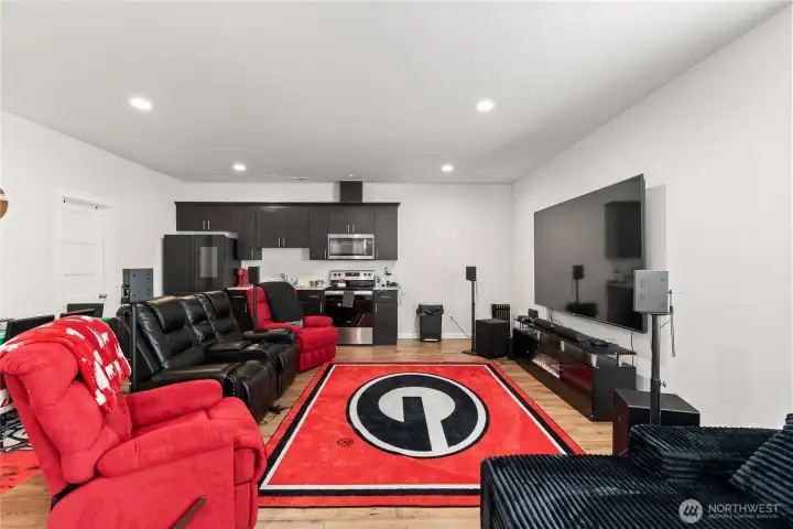 Lower level living room with full kitchen facilities Lower level living room with full kitchen facilities