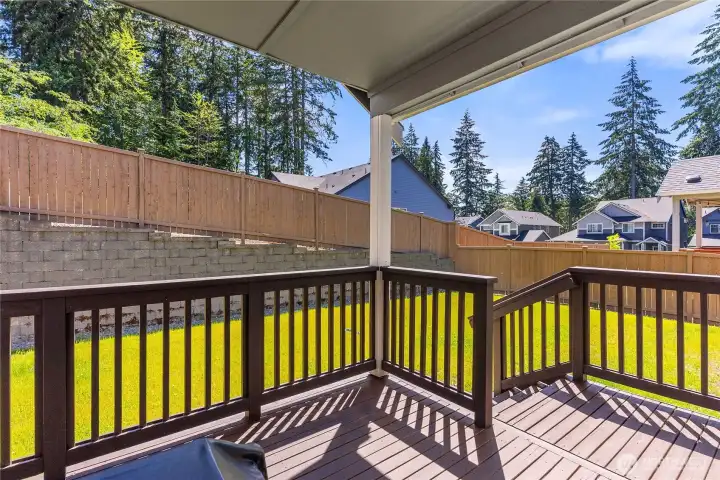 From rear deck looking into the yard and fenced lot. No house is directly behind this lot, just driveway and yard space. From rear deck looking into the yard and fenced lot. No house is directly behind this lot, just driveway and yard space.