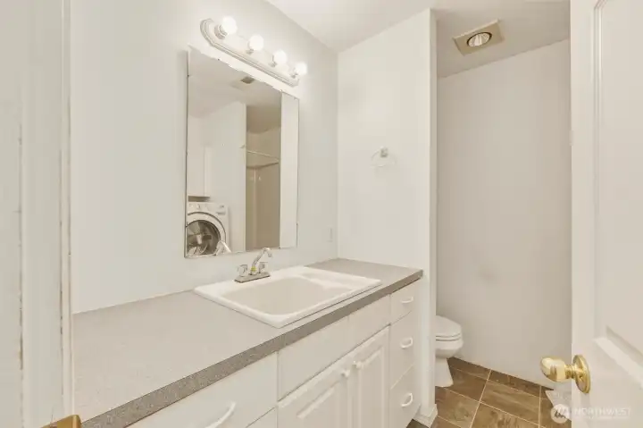 .75 Shared Bath w/ Washer & Dryer behind Door