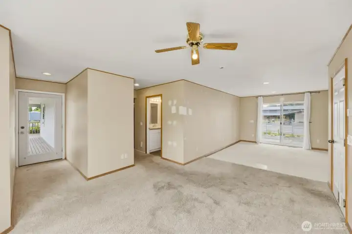 2nd Living Room features 2nd Entry Door under Covered Wrap Around Porch