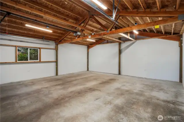 The clean and spacious oversized garage can also be used for a shop space if you so desire!