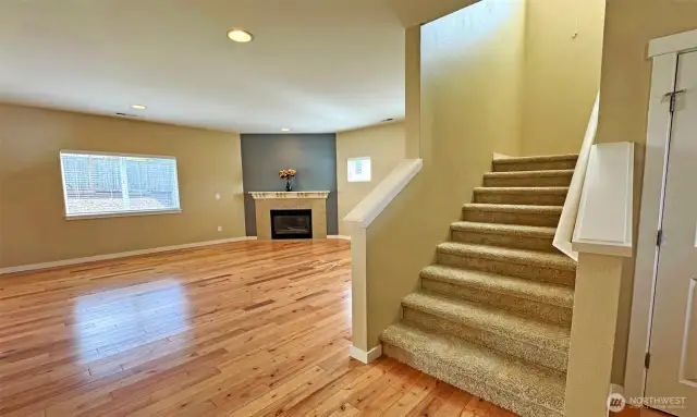 Stairs with landing! Hardwood flooring throughout entire main level