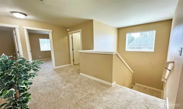 Stairs with landing leads to upper level ... large window at landing area brings in much more natural lights!