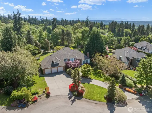 Three-Car Garage With Grand-Scale Driveway