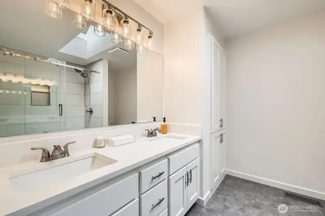 BEAUTIFULLY UPGRADED PRIMARY BATHRM SUITE W/ QUARTZ COUNTERS, DUAL SINKS, & UPDATES THROUGH OUT.