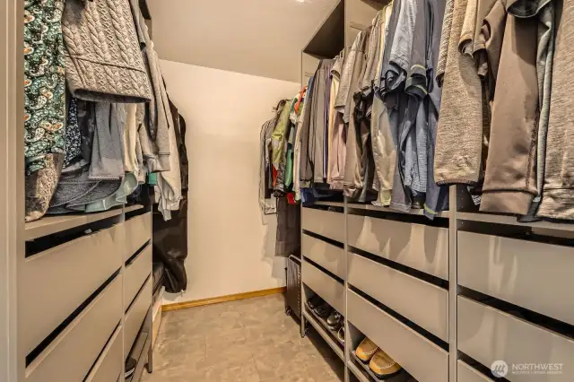 HUGE CUSTOM WALK-IN CLOSET.