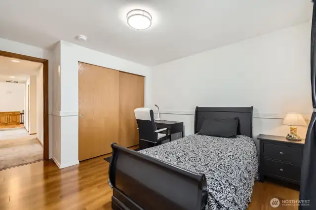 PLEASANT SECOND BEDROOM IS COMFY AND RELAXING WITH EASY ACCESS TO SECOND FULL BATHRM.