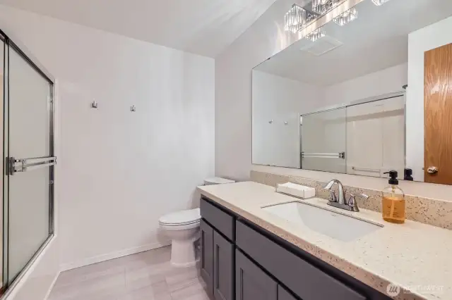 LOVLEY SECOND FULL BATHROOM IS UPDATED AND HAS IT ALL, PERFECT FOR FAMILY AND GUESTS.