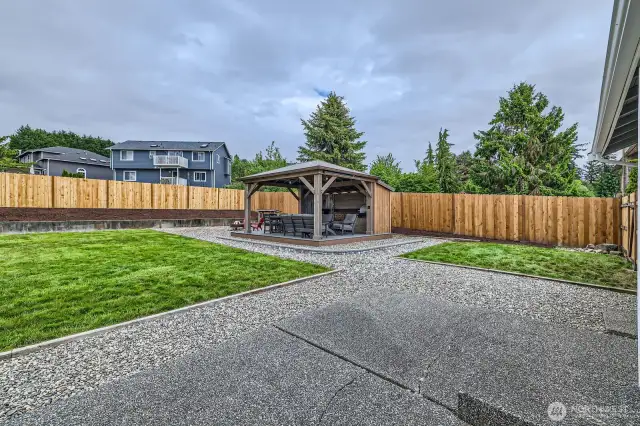 LARGE BACK YARD, FULLY FENCED, WITH ENTERTAINMENT GAZEBO.