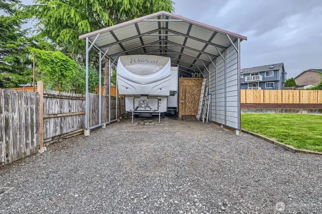 COVERED RV/BOAT PARKING (20’ X 35’) BEHIND THE SECURE GATE.