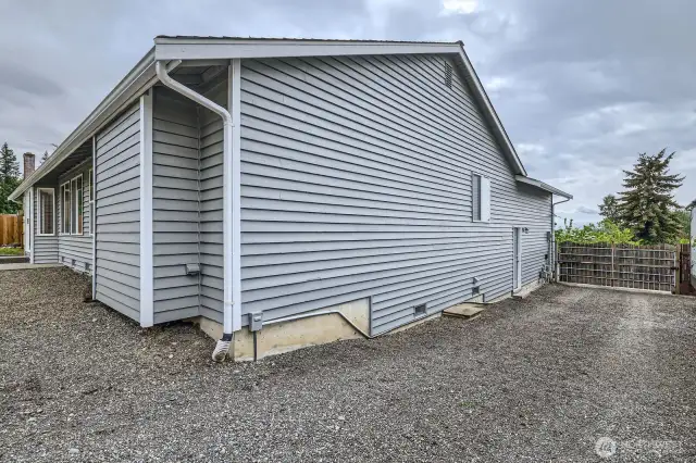 DEDICATED PARKING FOR THIS HOME IS IMPRESSIVE: DOUBLE RV SPACE OR BOAT PARKING, SECURE GATE. OR SIX CARS EASY.