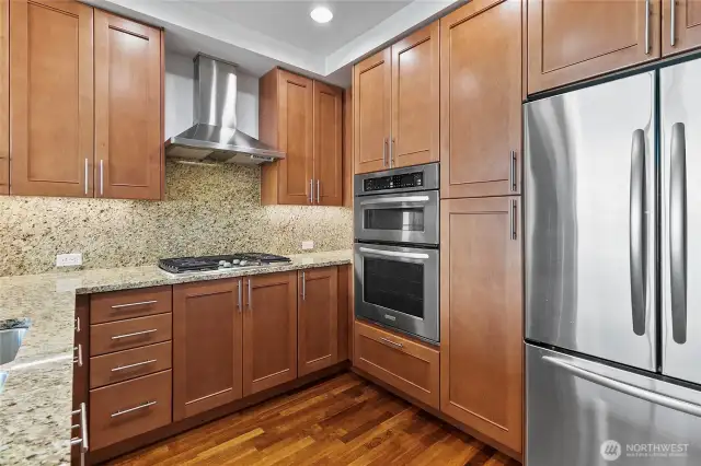 High end stainless steel appliances, granite counters and new hardwood floors