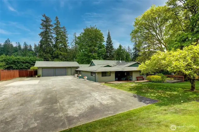 Large expansive Driveway concrete pad - ample parking previous pickleball court