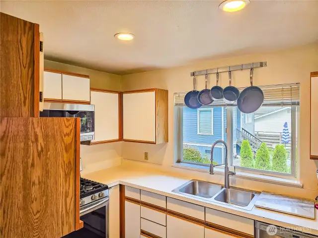 Full kitchen with appliances.