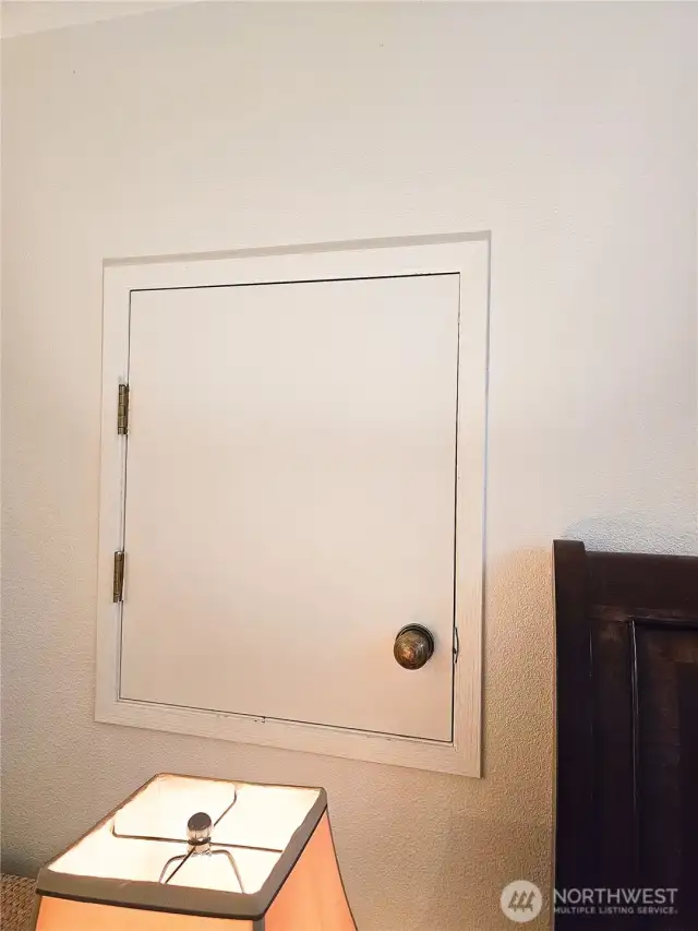 Storage at stairs and in second bedroom.