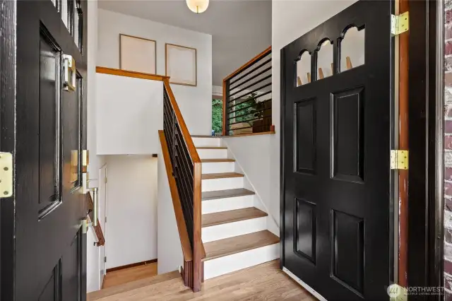 The welcoming entry floods with natural light.