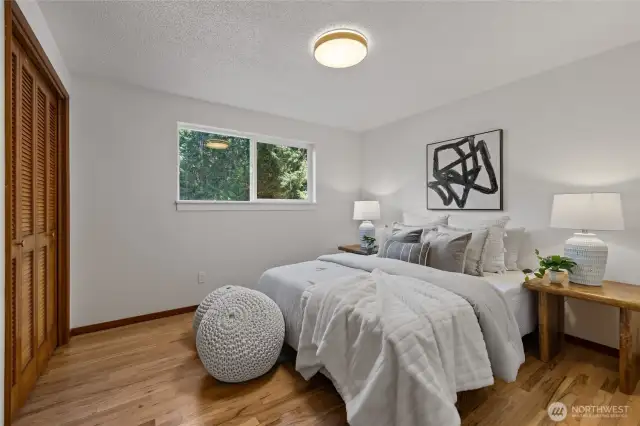 Two other sizable bedrooms offer ample space for all.