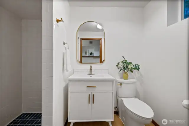A third bathroom is located downstairs.