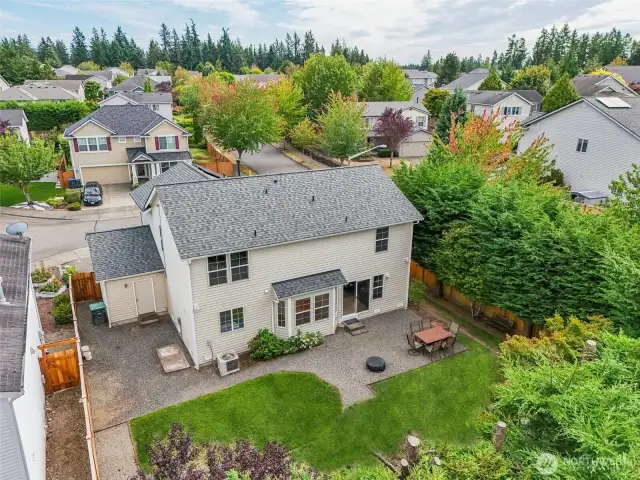 Fully fenced, spacious and level backyard, great for outdoor activities.