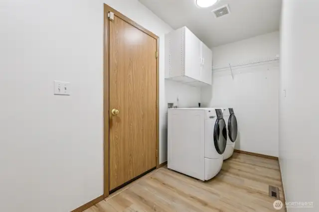 Spacious Laundry room as you enter from the garage.