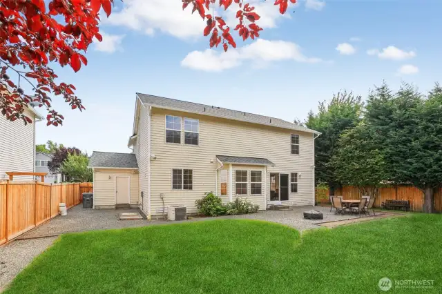 Large, Level, and fenced backyard