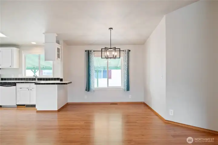 Dining room with new light fixture.