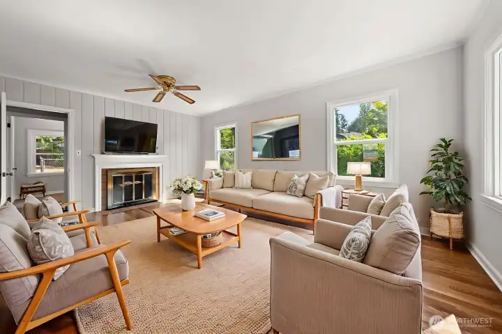 Living Room: Recently updated with beautiful, stained hardwood floors. Freshly painted throughout the home.