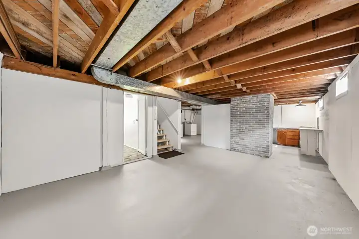 Lower Level is partially finished!  This open space has great ceiling height, no posts in the middle of the room and is waiting for your custom design. The entire basement has been freshly painted.