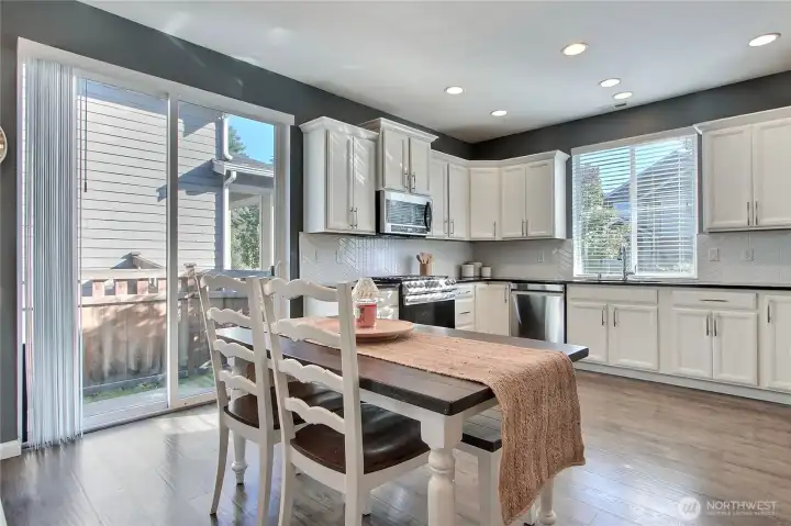 View of dining and kitchen.