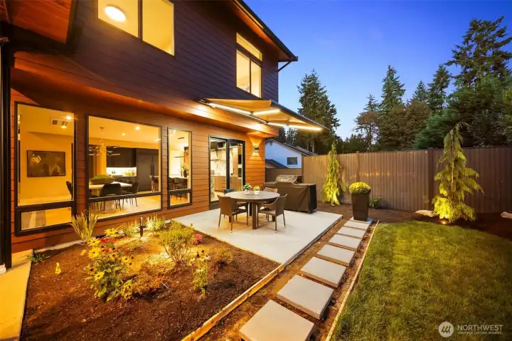 Showstopper outdoor space featuring covers patio, LED-lit auto awning and chef grade BBQ system.