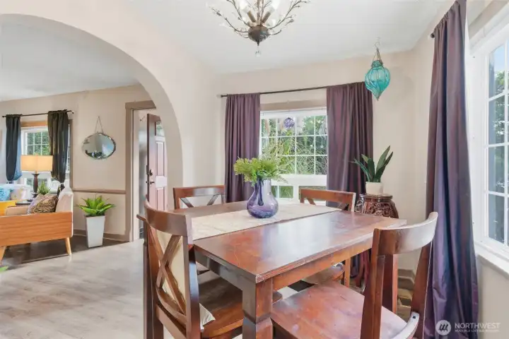 also arched entry into the bright dining room