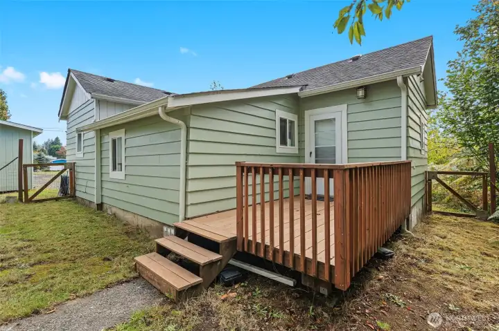 Fenced backyard and deck