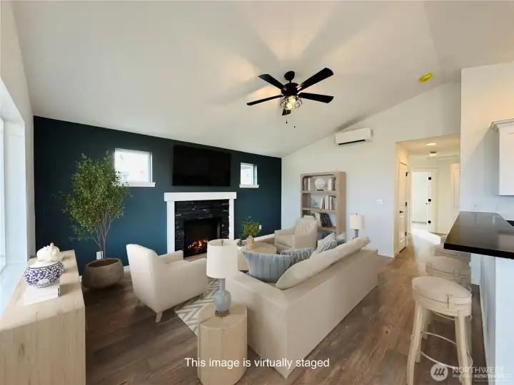 Light and bright living room with electric fireplace