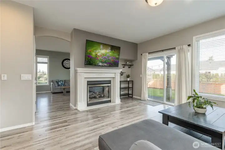 View of the double-sided fireplace from the family room