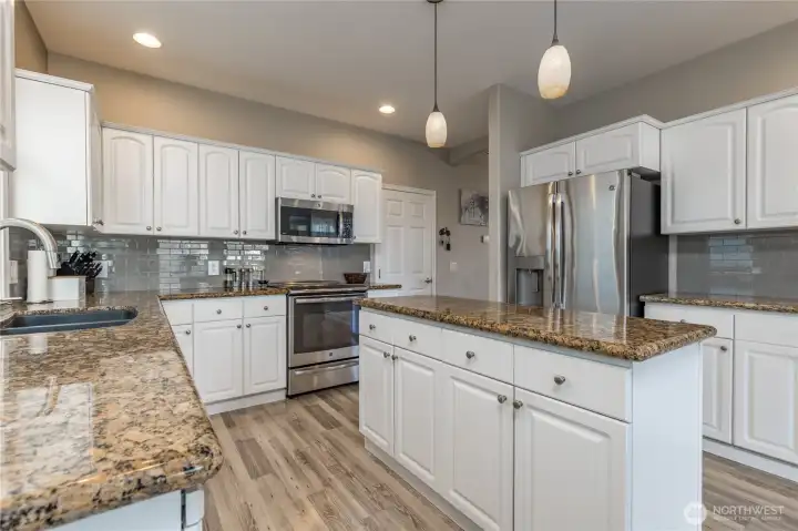 Tiled backsplash offers elegance and easy cleanup