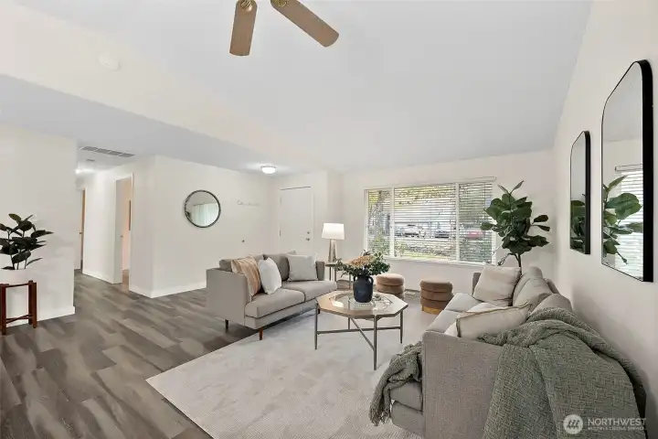 From dining room facing living room & entryway and hallway to additional bedrooms.